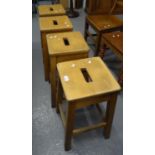 Set of four mid century beech laboratory stools with hand holes. (4) (B.P. 21% + VAT)