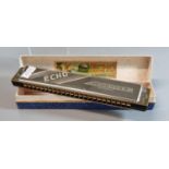 M. Hohner German 'The Echo' harmonica in original box. (B.P. 21% + VAT)