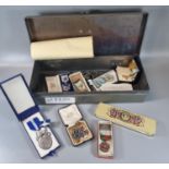 Strong box containing an assortment of Masonic Jewells to include: Coradog Lodge 1876 and others,