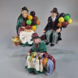 Three Royal Doulton bone china figures to include: 'Silks and Ribbons', 'The Old Balloon Seller' and