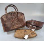 Box containing a leather ammo belt and two ladies reptile skin handbags; one crocodile and the other