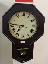 Victorian stained octagonal two train wall clock with key and pendulum. (B.P. 21% + VAT)