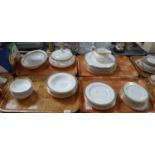 Four trays of Royal Doulton 'Clarendon' design dinnerware to include: bowls, sauceboat, lidded