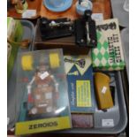 Collection of oddments to include: Zeroids Robot in perspex case, two Merit toy Morse Code toys,