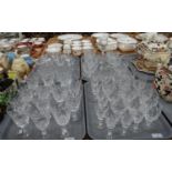 Four trays of glassware to include: various drinking vessels, liqueur glasses, dessert bowls, set of