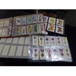 Cigarette cards selection of sets and part sets in three albums: Players and Wills. (B.P. 21% + VAT)