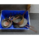 Box of copper pans and two skillets. (B.P. 21% + VAT)