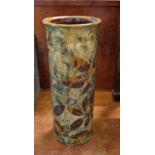 Early 20th century Royal Doulton stoneware cylinder stick stand decorated with autumn leaves. (B.