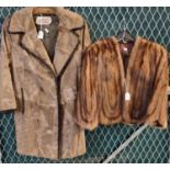 Vintage striped brown fur capelet and a National Fur Company Ltd calf skin short coat or jacket. (2)