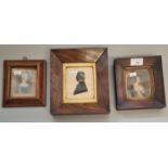 19th century portrait silhouette of a minister with painted highlights within rosewood frame
