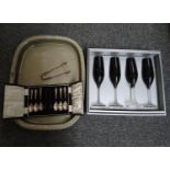 Boxed set of four Royal Doulton etched glass champagne glasses, together with plated sugar nips,