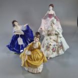 Three Royal Doulton bone china figurines to include: 'Elaine', 'Diana', 'Coralie' and Coalport '