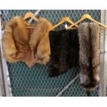 Collection of three vintage fur items to include: a light brown fox fur cape, a dark grey moleskin