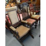 Early 20th Century American spring rocking armchair. Together with a Victorian high back hall