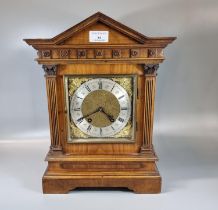 Early 20th century walnut architectural two train mantle clock, with silver chapter ring and Roman