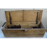 Pine carpenter's tool box containing assorted tolls including: saws, brace and bit, block planes,