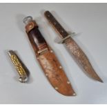 Vintage Boy Scouts sheath knife with leather scabbard and grip, folding clasp knife and another bone