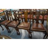 Set of four Ercol elm and beech hoop and spindle back kitchen chairs, together with a set of four