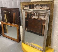 Collection of four mirrors: early 20th century oak with moulded beaded decoration and two modern