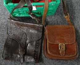 Box containing two vintage leather handbags or biker bags. (B.P. 21% + VAT)