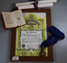 Acton Chamber of Commerce Masonic Medal together with a Freemasons Handbook 1908, framed R. A. O. B.