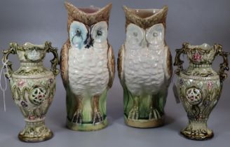 Pair of majolica pitcher jugs in the form of owls. 27cm high approx. Together with a pair of