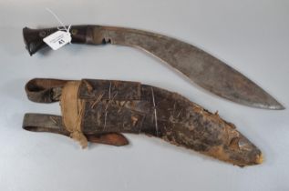 Nepalese Kukri in leather scabbard with laced frog having two belt loops. (B.P. 21% + VAT)