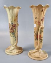 Pair of Royal Worcester fluted and relief moulded trumpet vases painted with flowers and foliage