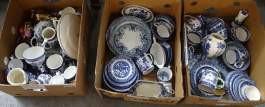 Three boxes of china, mostly blue and white to include: various 'willow' pattern; plates, mugs