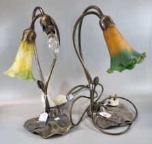Two similar Art Nouveau style bronzed table lamps with floral iridescent shades. (2) (B.P. 21% +