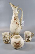 Grainger's Worcester porcelain ewer, of baluster form, gilded and painted with birds amongst foliage