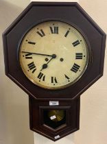 Victorian stained octagonal two train wall clock with key and pendulum. (B.P. 21% + VAT)