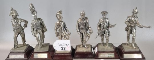 Group of six polished pewter soldiers, to include: The Prince of Wales Hussars, The 22nd Cheshire