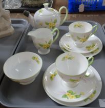 Shelley primrose design part teaset to include: two trios, small teapot, milk jug and sugar bowl. (