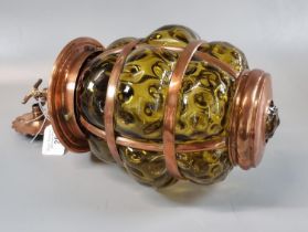A hanging copper banded and green bubbled glass lantern. 33cm high approx. (B.P. 21% + VAT)
