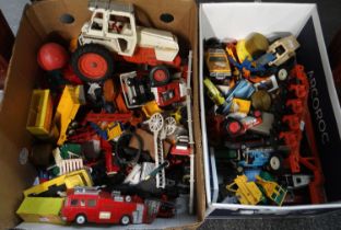 Two boxes of playworn diecast and other model vehicles to include: Dinky Toys ERF Fire Tender,