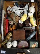 Box of assorted items to include: pottery vases, carved elephant bookends, cowrie shells, wall