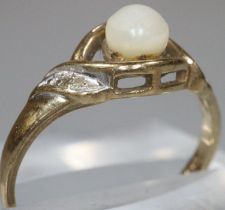 9ct gold and faux pearl dress ring. 1.4g approx. Size K. (B.P. 21% + VAT)