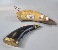 Rustic bull's horn type flask together with another metal mounted horn shaped flask with brass
