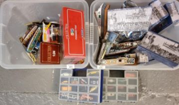 Two crates of small scale diecast model vehicles, many in original packaging. (2) (B.P. 21% + VAT)