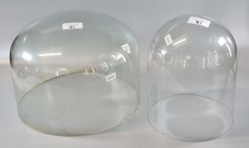 Two glass clock or taxidermy domes. (2) (B.P. 21% + VAT)