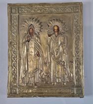 Small brass Orthodox Church Icon, the frame revealing painted portraits of two Saints, believed to