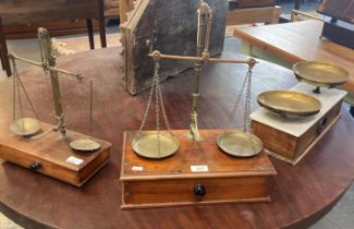 Collection of early 20th century apothecary scales, one on a marble base, one marked 'W T Avery'. (