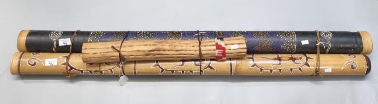 Large hand painted Didgeridoo together with two Rainsticks. (3) (B.P. 21% + VAT)