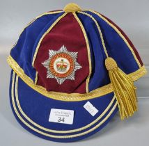 An Honorary sport's cap presented by the Queen's Own Guards, for Rugby. (B.P. 21% + VAT)