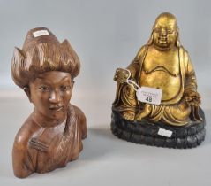 A gilt seated Buddha on stand, probably cast resin. 20cm high approx. Together with a carved