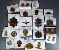 Collection of military badges to include: collar badges, Royal Artillery, Canadian Military