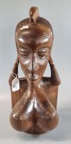 African carved wood bust of a woman. (39cm high approx). (B.P. 21% + VAT)