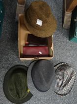 Box of men's vintage fashion accessories to include: four hats; a green suede Hushpuppies,