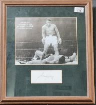 Framed black and white photograph 'Muhammad Ali V Sonny Liston'. 20x26cm approx. Bearing signature